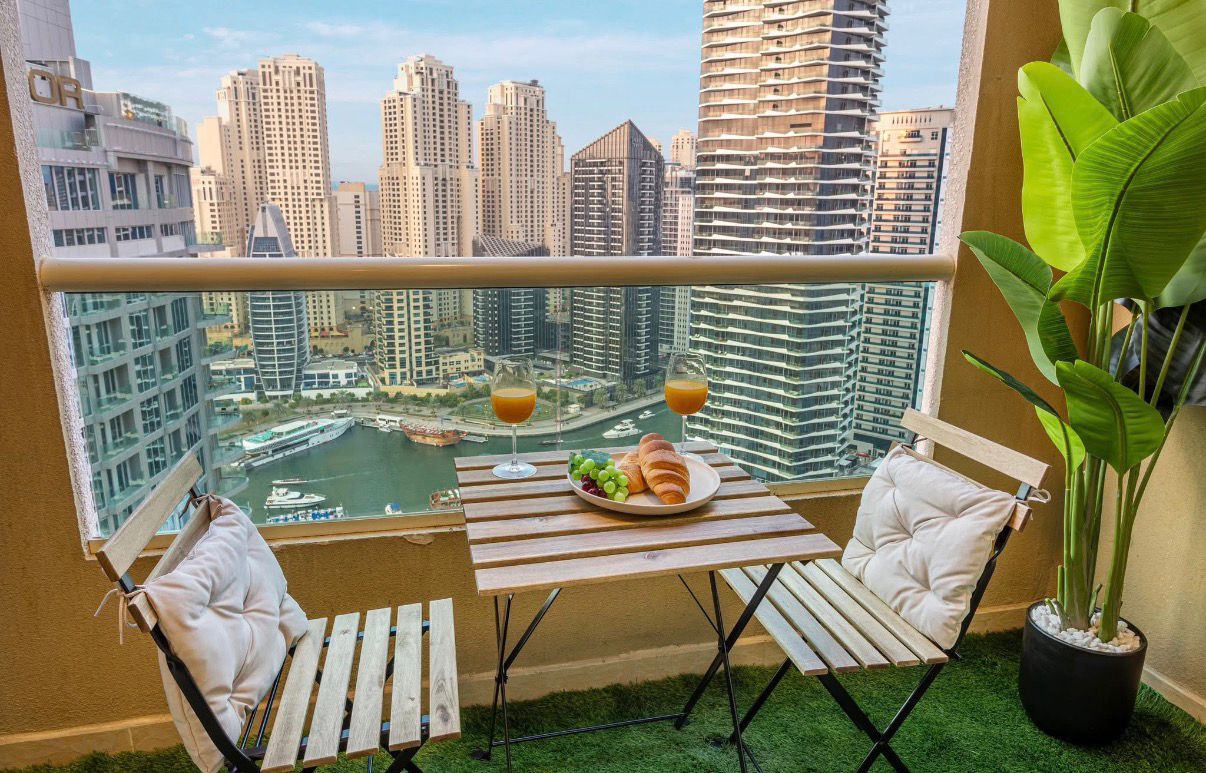 Marina-view apartment balcony at Happy Panda Holiday Homes